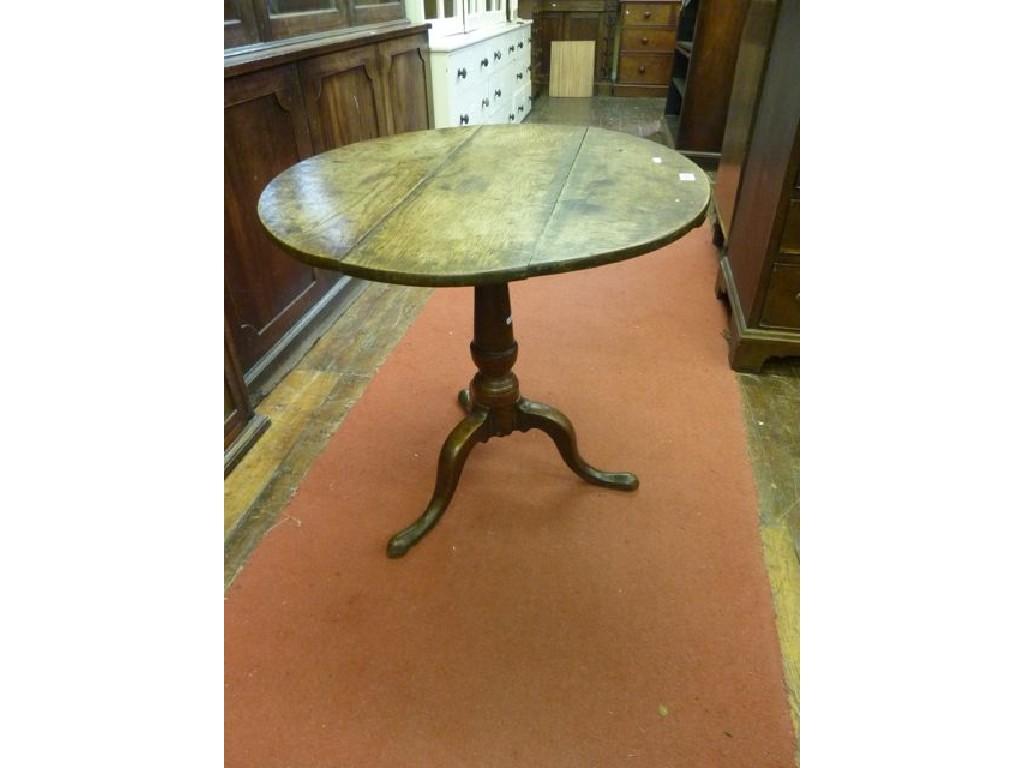 Appraisal: A th century oak snap top occasional table of circular