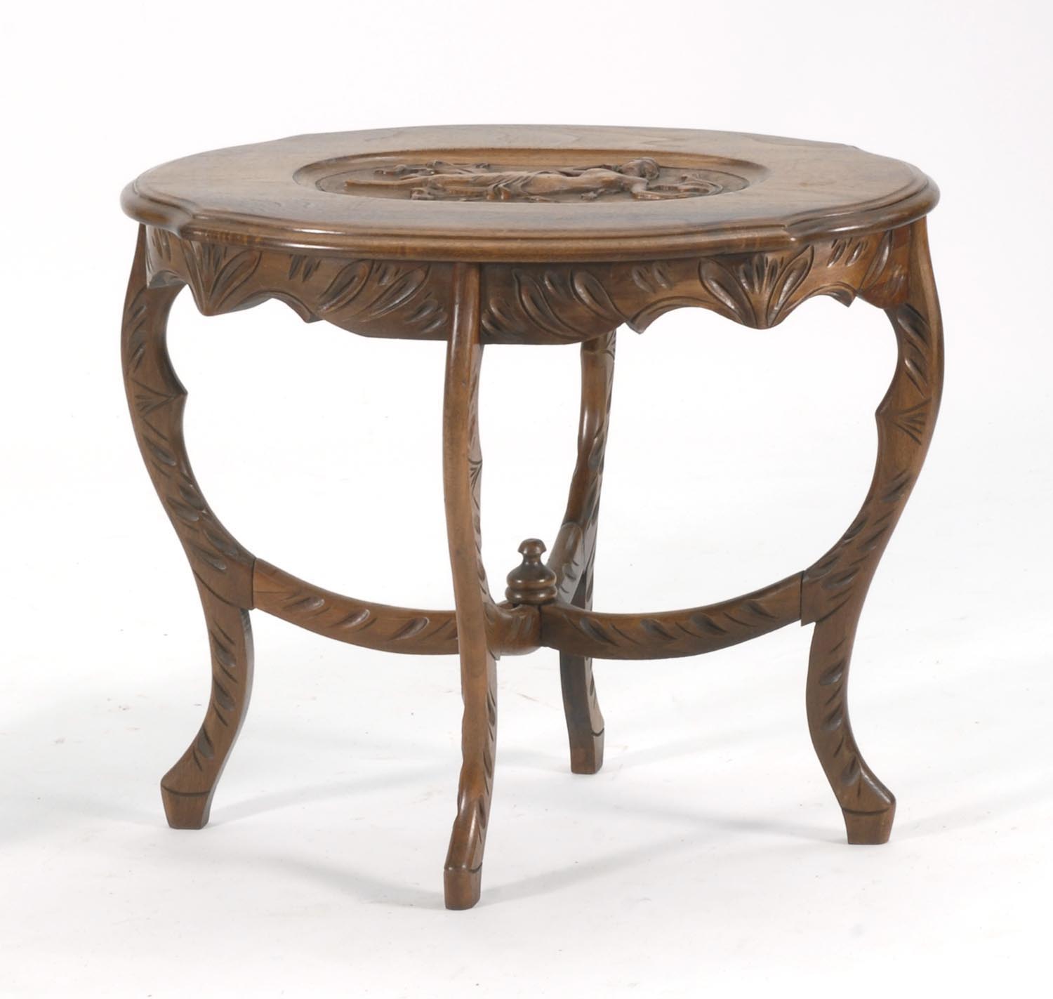 Appraisal: CARVED WALNUT TABLE in turtle-top form Central oval panel with