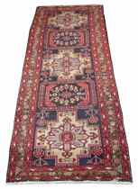 Appraisal: Kazak Carpet ca 's Great Kazak runner featuring five large