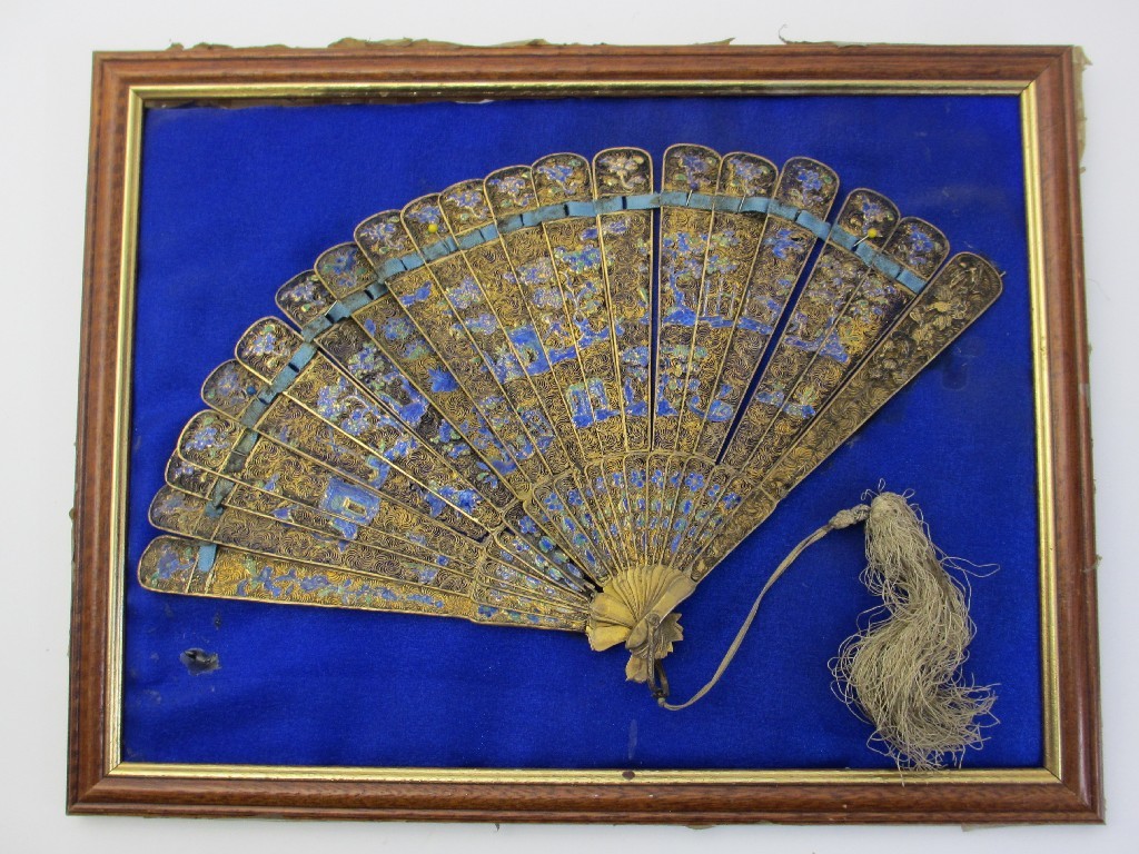 Appraisal: A Chinese gilt metal and enamel fan decorated with gardens