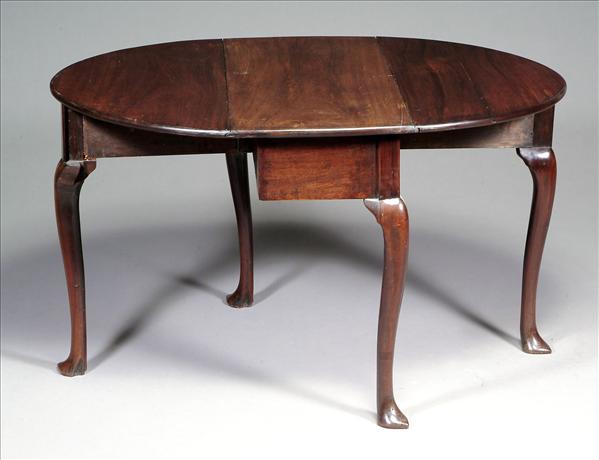 Appraisal: A George II mahogany oval drop-leaf table circa the plain