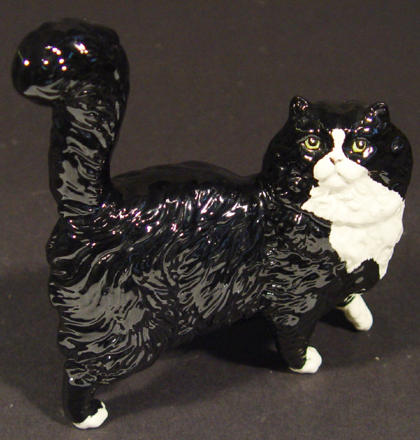 Appraisal: Royal Doulton black and white china cat with hand painted