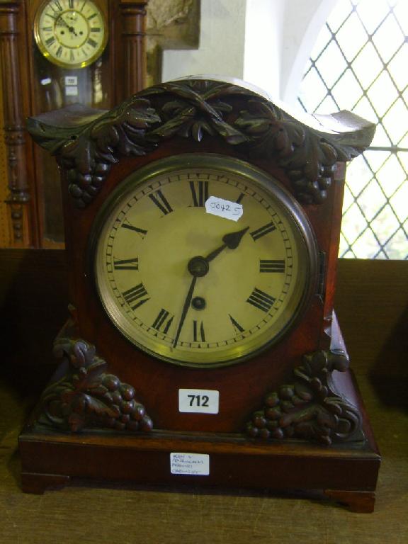 Appraisal: A th century mahogany bracket clock with carved and applied