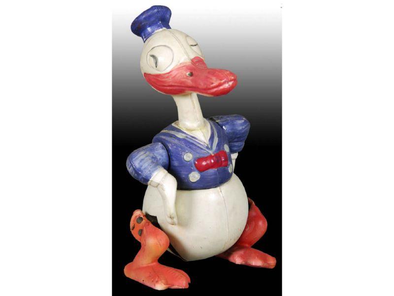 Appraisal: Walt Disney Celluloid Donald Duck Waddler Toy Description - ''