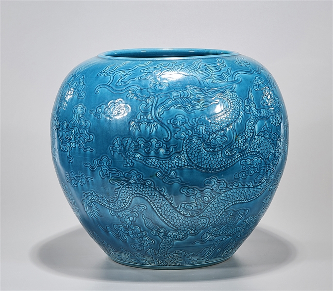 Appraisal: Large Chinese blue glazed porcelain water pot with dragons chasing