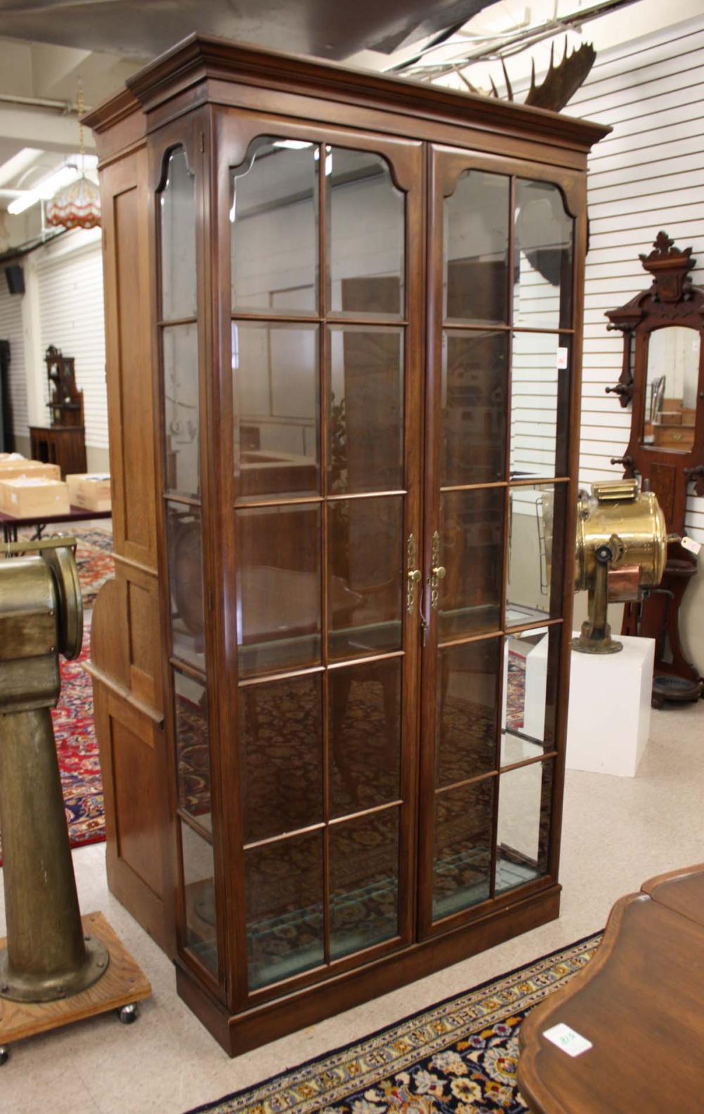 Appraisal: CUSTOM SIMON CLASSIC CURIO CABINET having two full-length doors each