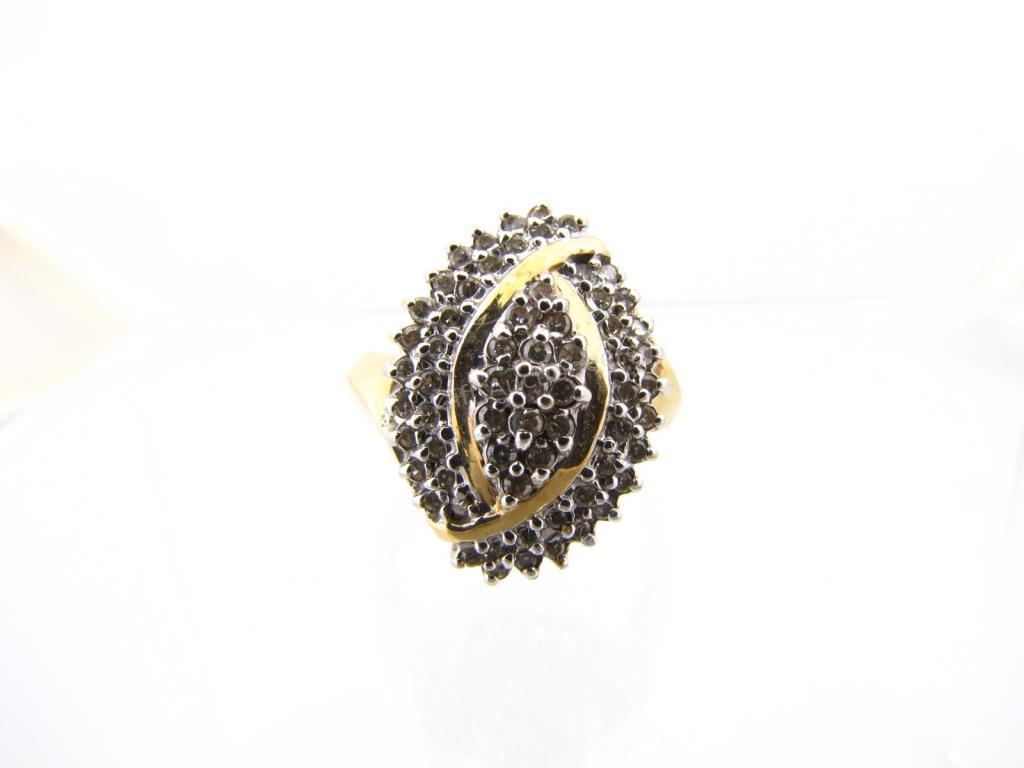 Appraisal: A K yellow gold diamond pave marquis shaped ring with