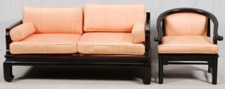 Appraisal: CHINESE TEAKWOOD SOFA AND ARMCHAIR Having peach cushions and arm