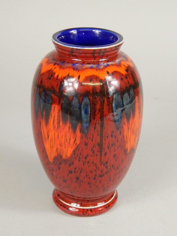 Appraisal: A modern Poole pottery Delphis style vase with a flambe