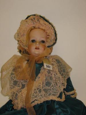 Appraisal: A C M Bergmann bisque head girl doll with blue