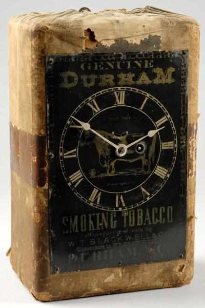 Appraisal: Durham Tobacco Pouch Clock Description Time only Depicting a cow