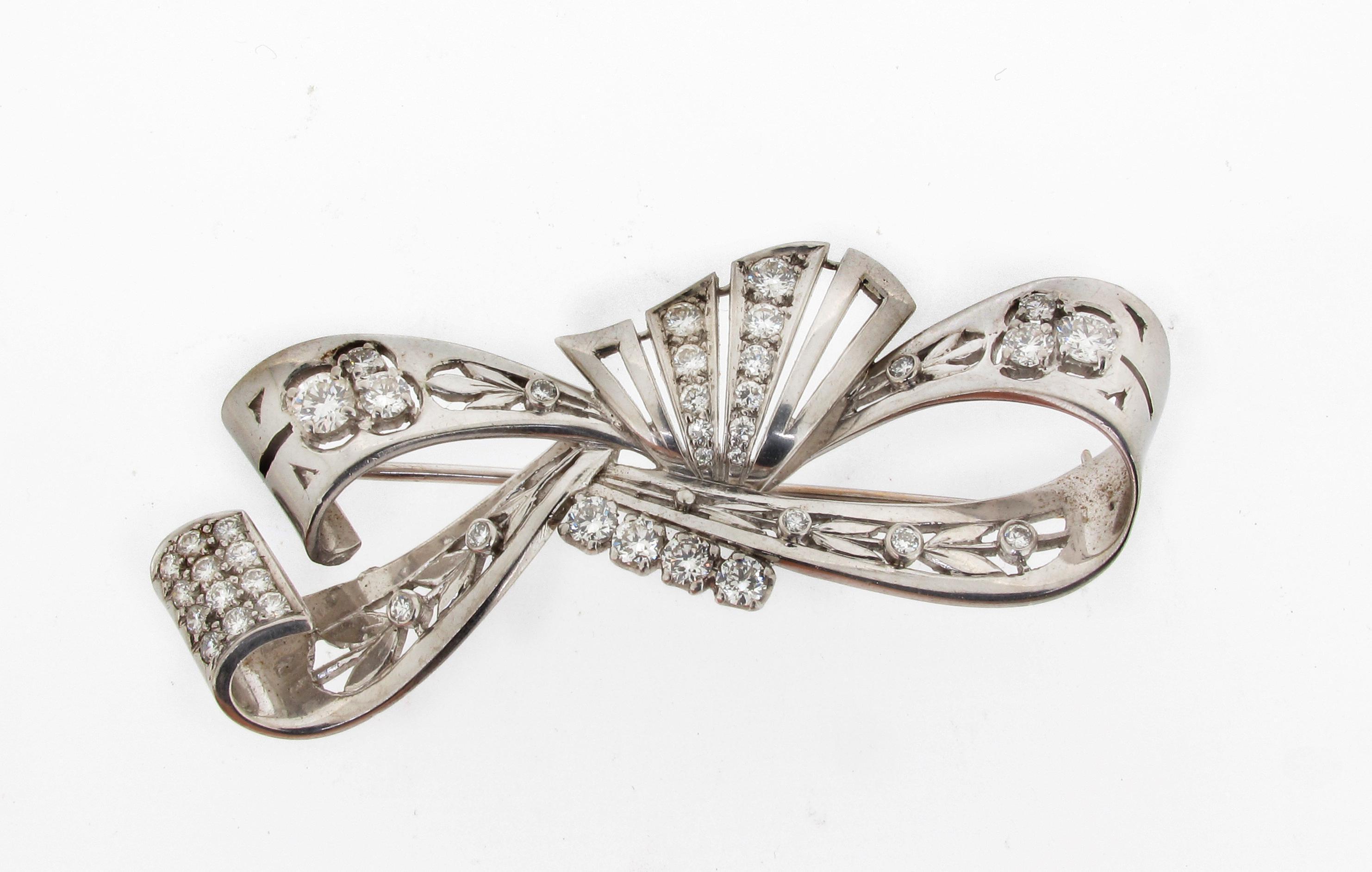 Appraisal: A diamond and palladium brooch by Lambert brothers