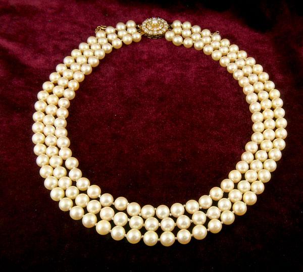 Appraisal: A three row Cultured Pearl Necklace with ct gold circular