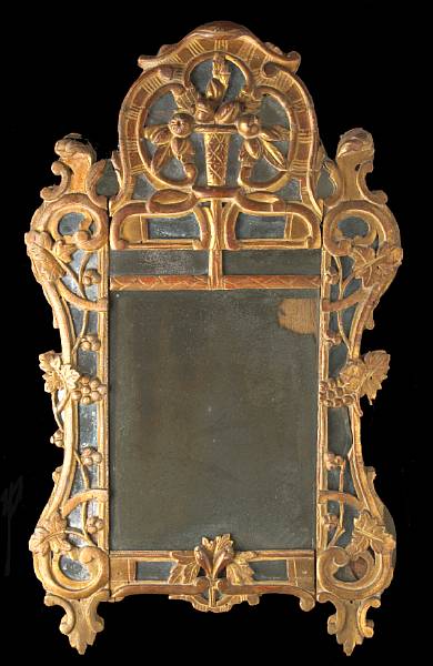 Appraisal: An Italian Rococo style giltwood mirror th century height in