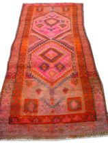 Appraisal: A Tribal Runner th Century Two medallion colors are pinks