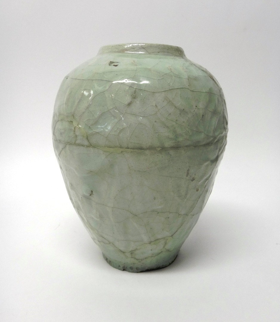 Appraisal: A large Safavid moulded pottery jar Iran th century of