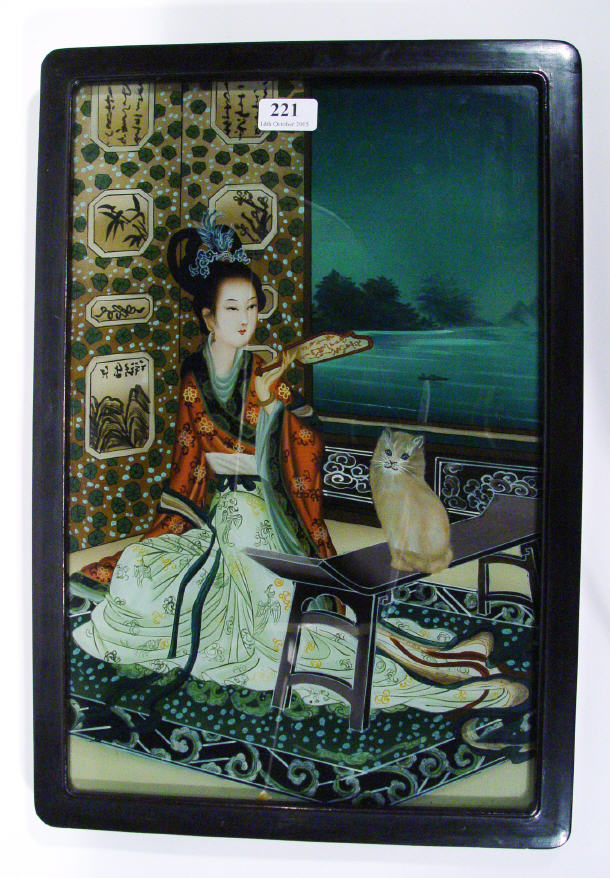 Appraisal: Oriental oil painting onto glass of a geisha girl reading