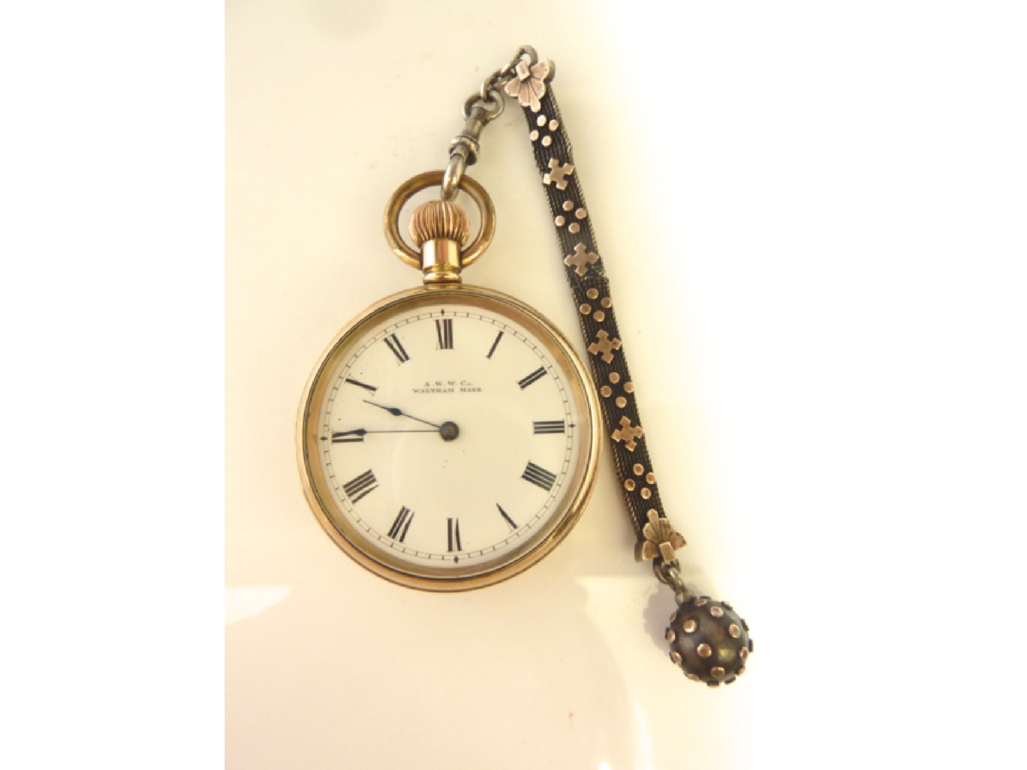 Appraisal: An American gold-plated open-faced pocket watch A W W Co