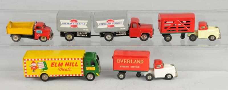 Appraisal: Lot of Tin Truck Friction Toys Description Japanese Working Includes