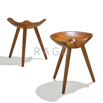 Appraisal: MOGENS LASSEN K THOMSEN Pair of solid teak three-legged stools