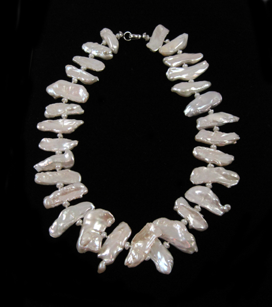 Appraisal: PRINCESS LENGTH BAROQUE PEARL NECKLACE measuring inches in length and