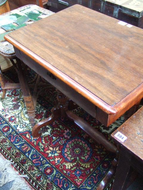 Appraisal: A th century walnut work table with fitted frieze drawer