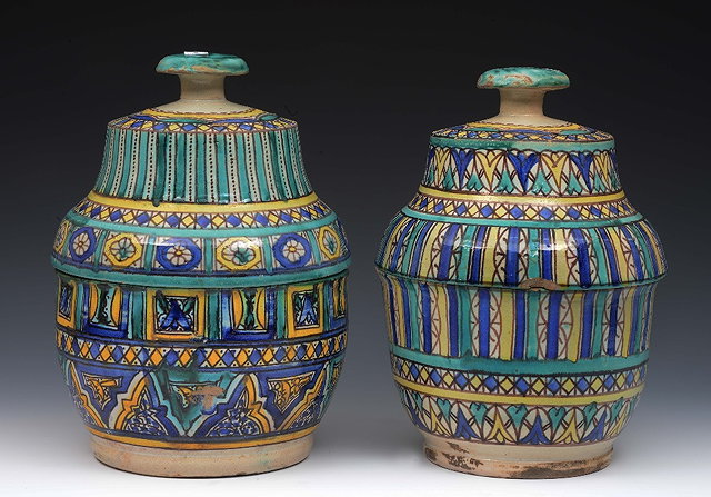 Appraisal: Two Moroccan polychrome ceramic butter pots or jobbanalate th early