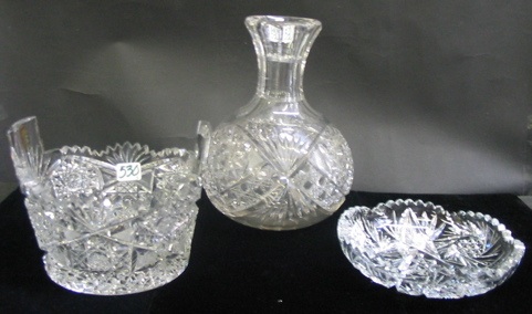 Appraisal: THREE ARTICLES OF AMERICAN CUT CRYSTAL One is a water