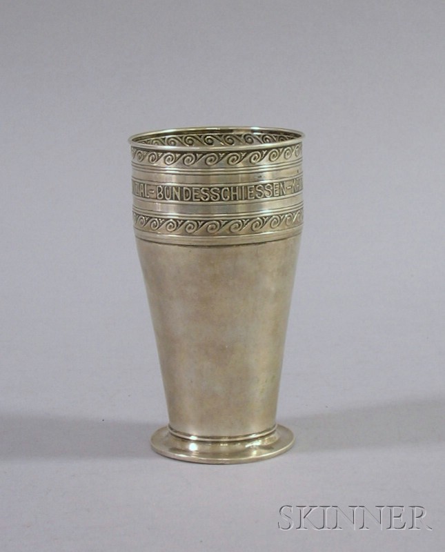 Appraisal: German Silver Tumbler silver with footed base and scrolled upper