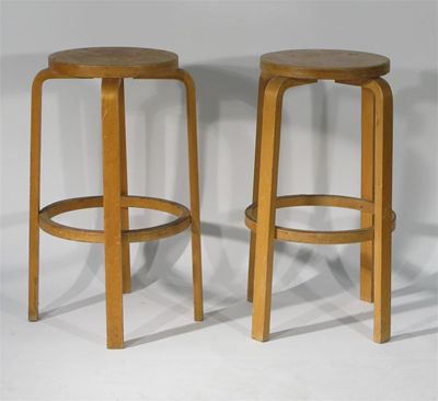 Appraisal: A pair of bentwood stools designed by Alvar Aalto cm