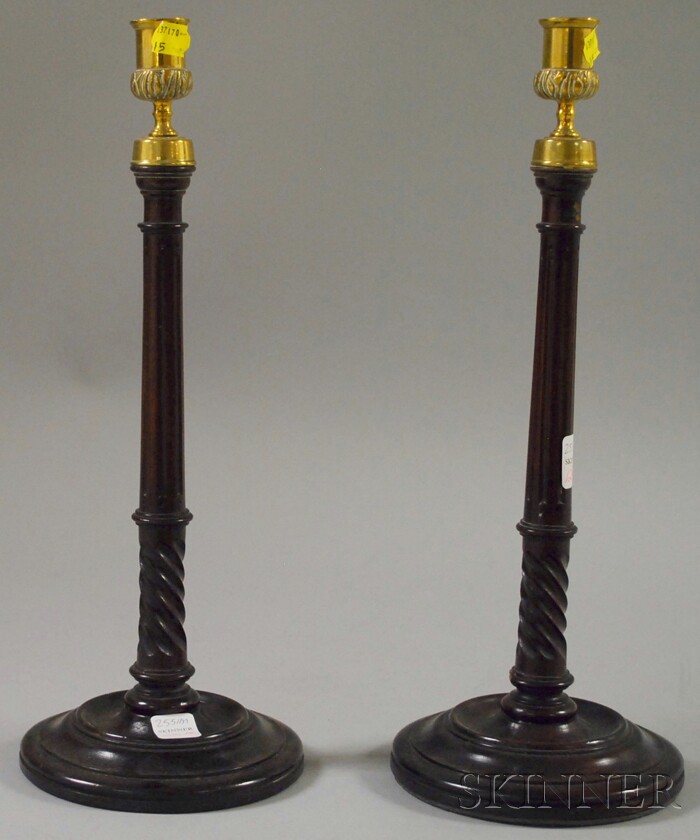 Appraisal: Pair of Carved Mahogany Columnar Candlesticks with Brass Candle Sockets