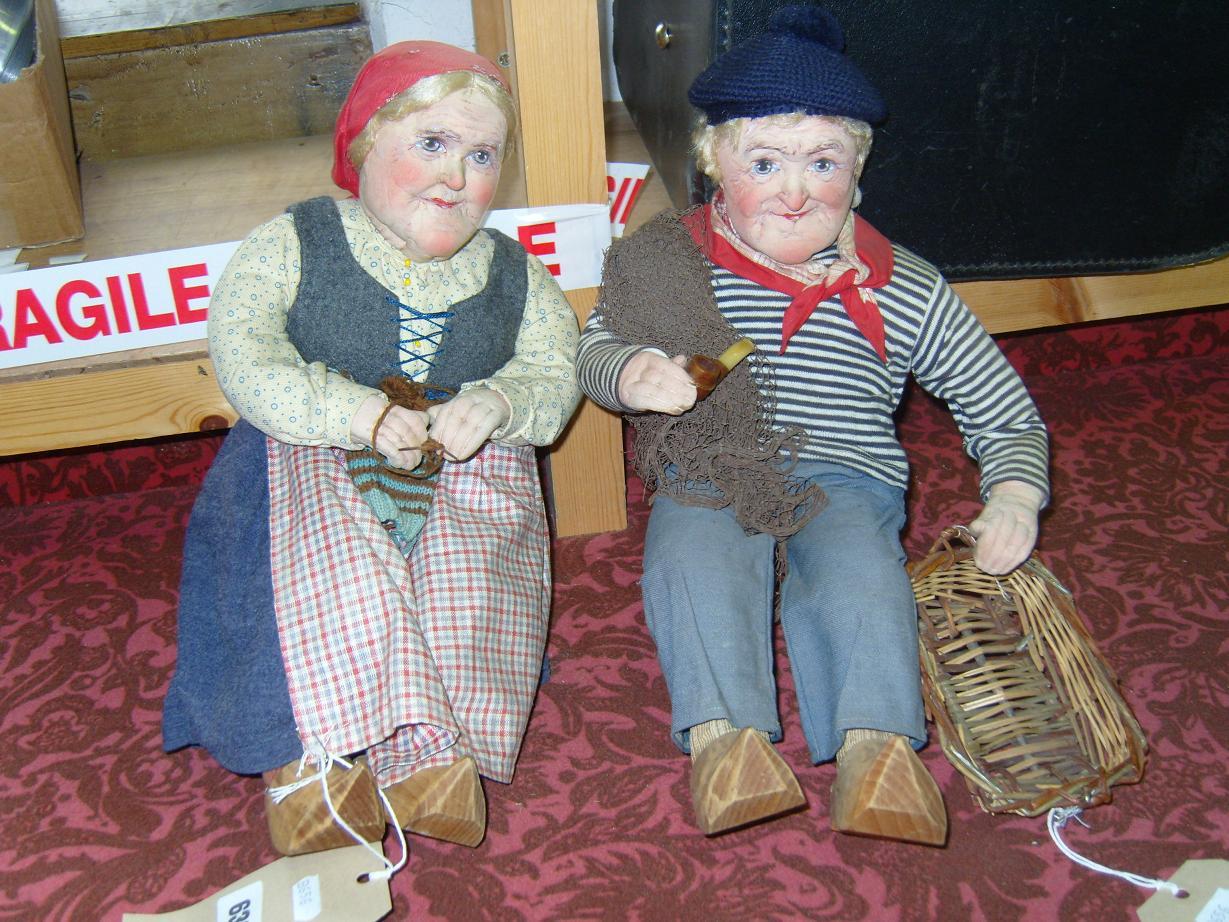 Appraisal: A pair of Ravca character dolls with moulded and painted