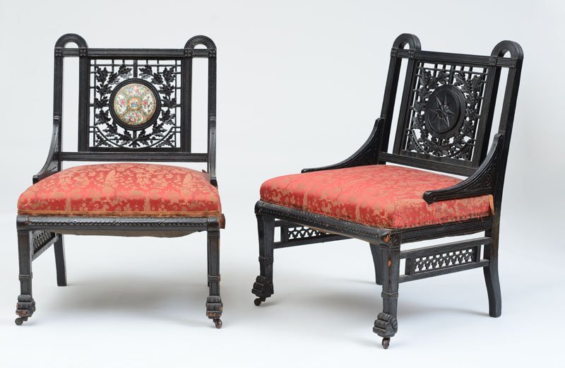 Appraisal: PAIR OF AESTHETIC MOVEMENT EBONIZED SLIPPER CHAIRS With rose medallion