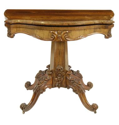 Appraisal: An early Victorian rosewood card table the serpentine hinged and