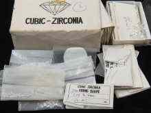 Appraisal: A mixed lot comprising approx packets of cubic-zirconia a bag