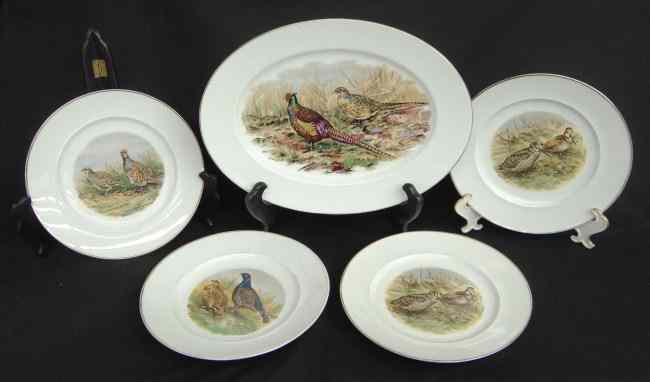 Appraisal: Five piece set including platter and four plates All marked