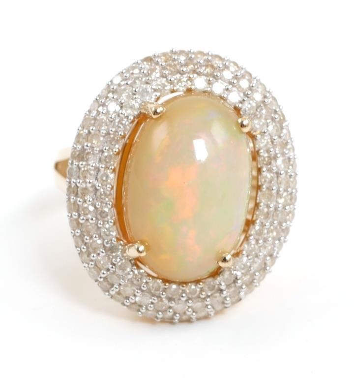 Appraisal: One electronically tested KT yellow gold ladies cast opal and