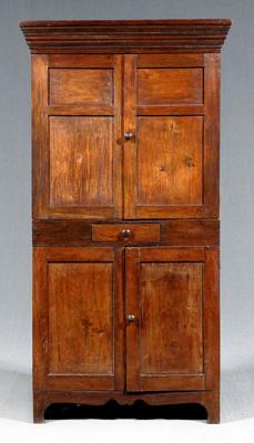 Appraisal: North Carolina walnut corner cupboard one-case construction with poplar secondary