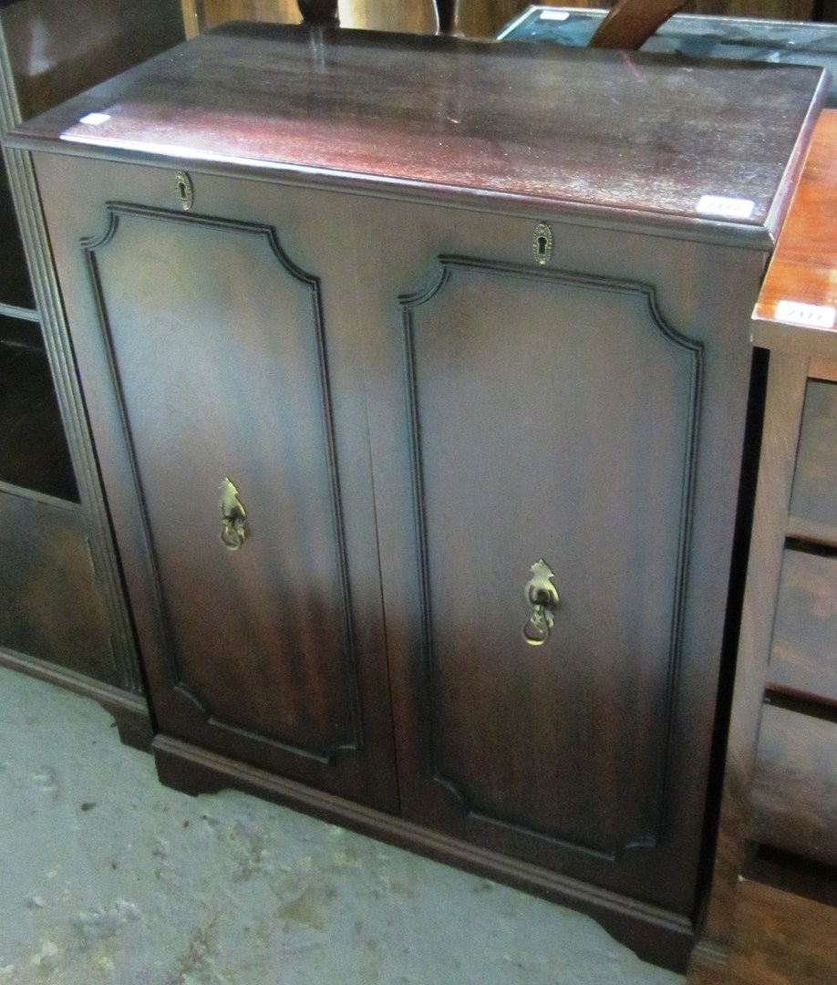 Appraisal: A th century mahogany drinks cabinet