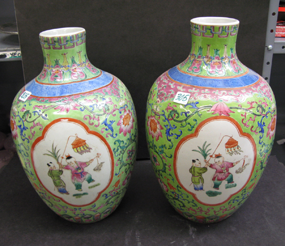 Appraisal: PAIR OF CHINESE FAMILE VERTE PORCELAIN VASES hand enameled with