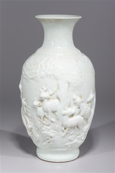 Appraisal: Chinese white glazed vase with molded deer in high relief