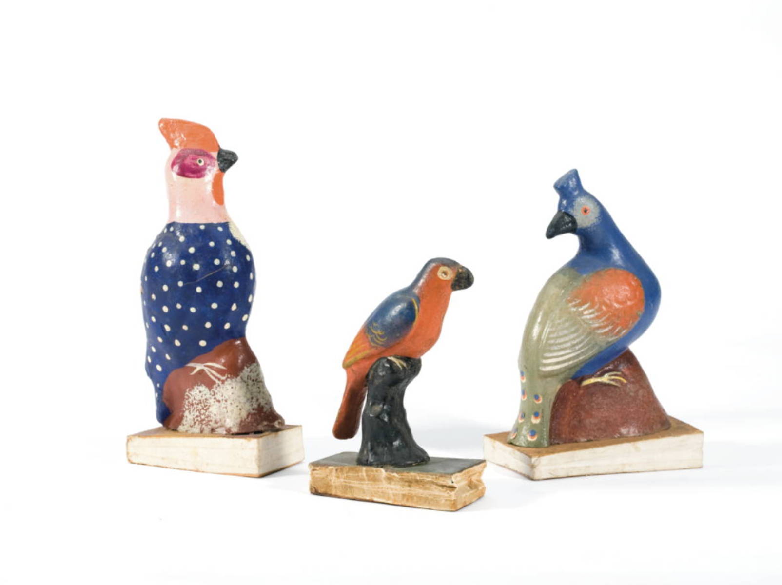 Appraisal: THREE PAINTED PAPIER MACHE WOOD CLOTH OR LEATHER BIRD SQUEAK