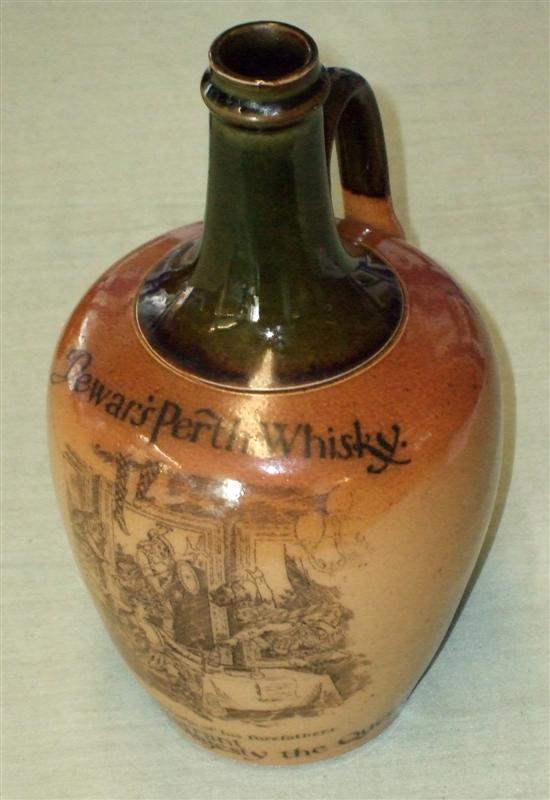 Appraisal: Doulton Lambeth 'Dewar's Perth Whisky' flask with green neck and