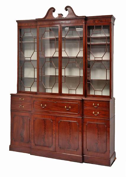 Appraisal: A George III mahogany breakfront secretary bookcase late th century