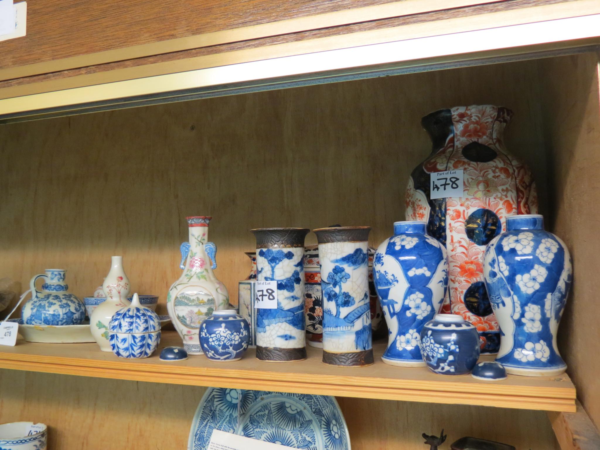 Appraisal: A group of Oriental ceramics including an enamelled vase with