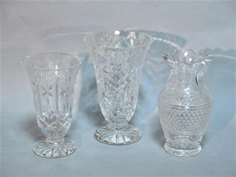 Appraisal: THREE WATERFORD CUT GLASS VASES Marked including two flaring on