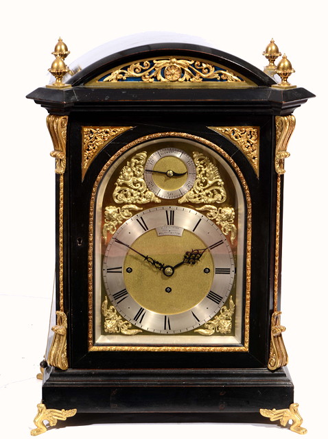 Appraisal: A VICTORIAN BOARDROOM OR TABLE CLOCK the arched brass dial