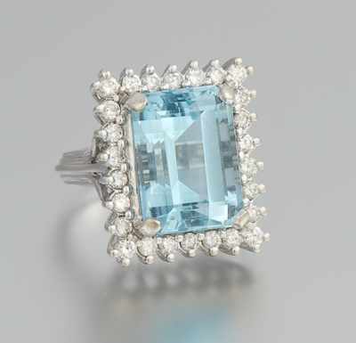 Appraisal: A Blue Topaz and Diamond Ring k white gold ring