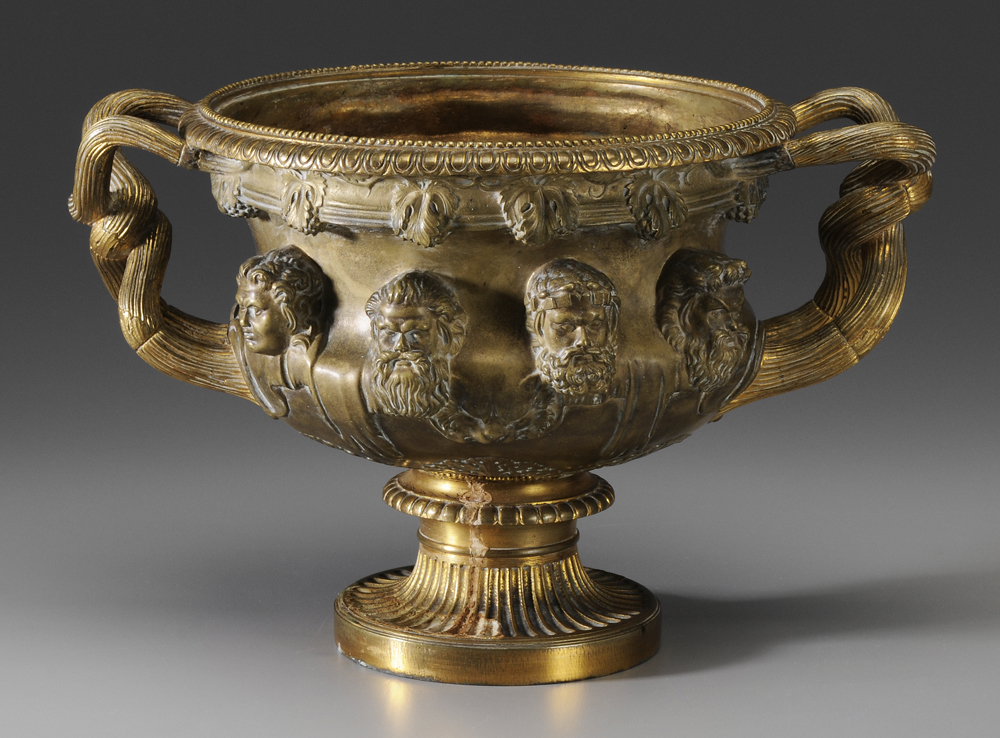 Appraisal: Gilt Bronze Urn Continental th century bold relief castings of