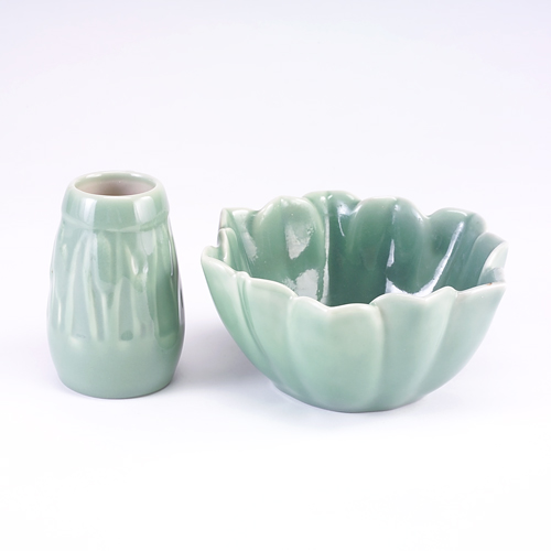 Appraisal: ROOKWOOD Two Production porcelain pieces covered in celadon glaze an